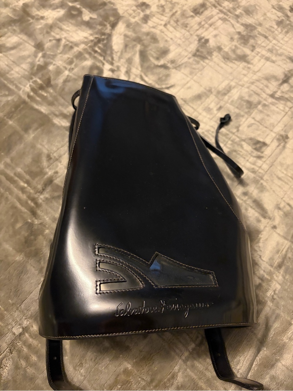 Salvatore Ferragamo Black Leather Drawstring Backpack with Embossed Logo